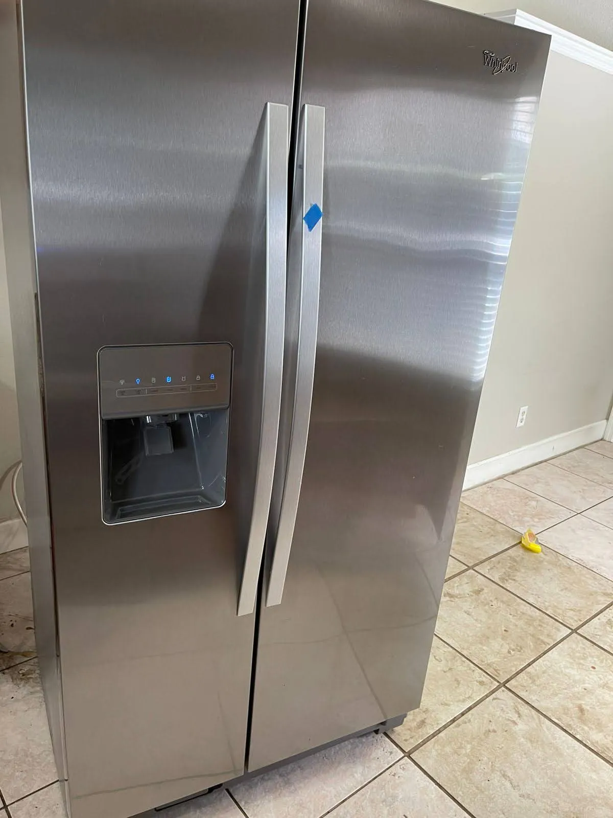 Stainless steel side-by-side refrigerator exterior after cleaning