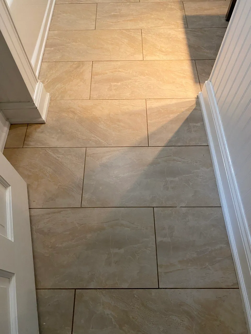 Large-format tile floor cleaned and dried in an Ephrata, PA bathroom